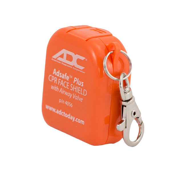 Bright orange CPR Micro Face Shield Key Chain with airway valve, featuring compact protective case, metal clip attachment, and white ADC logo and text printed on surface