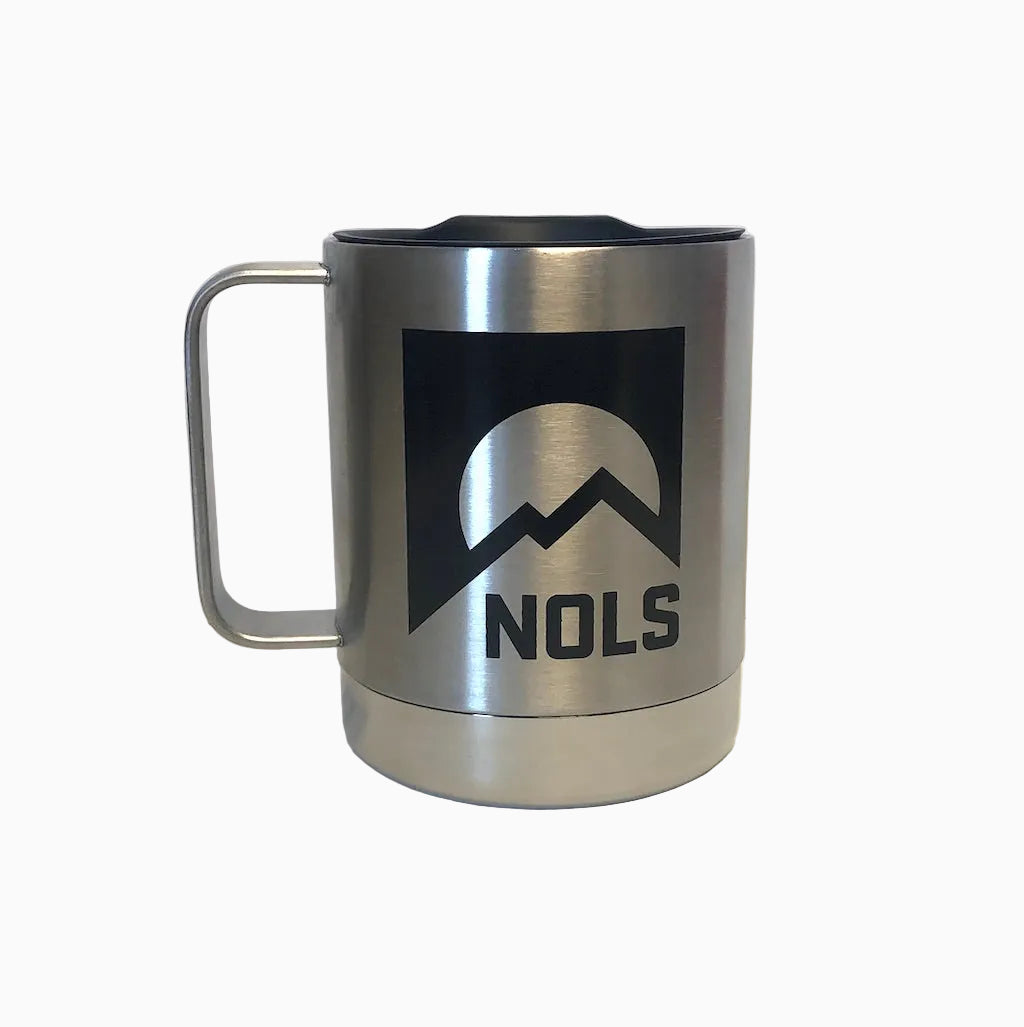 Klean Kanteen NOLS Camp Mug in brushed stainless steel with black NOLS mountain logo design, featuring a durable handle and splash-proof lid, displayed on white background